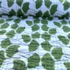 Green Leaf Kantha Quilt on Bed – Handmade Cotton Block Print Bedspread by OmraDecor