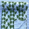 Green Leaf Kantha Quilt on Bed – Handmade Cotton Block Print Bedspread by OmraDecor