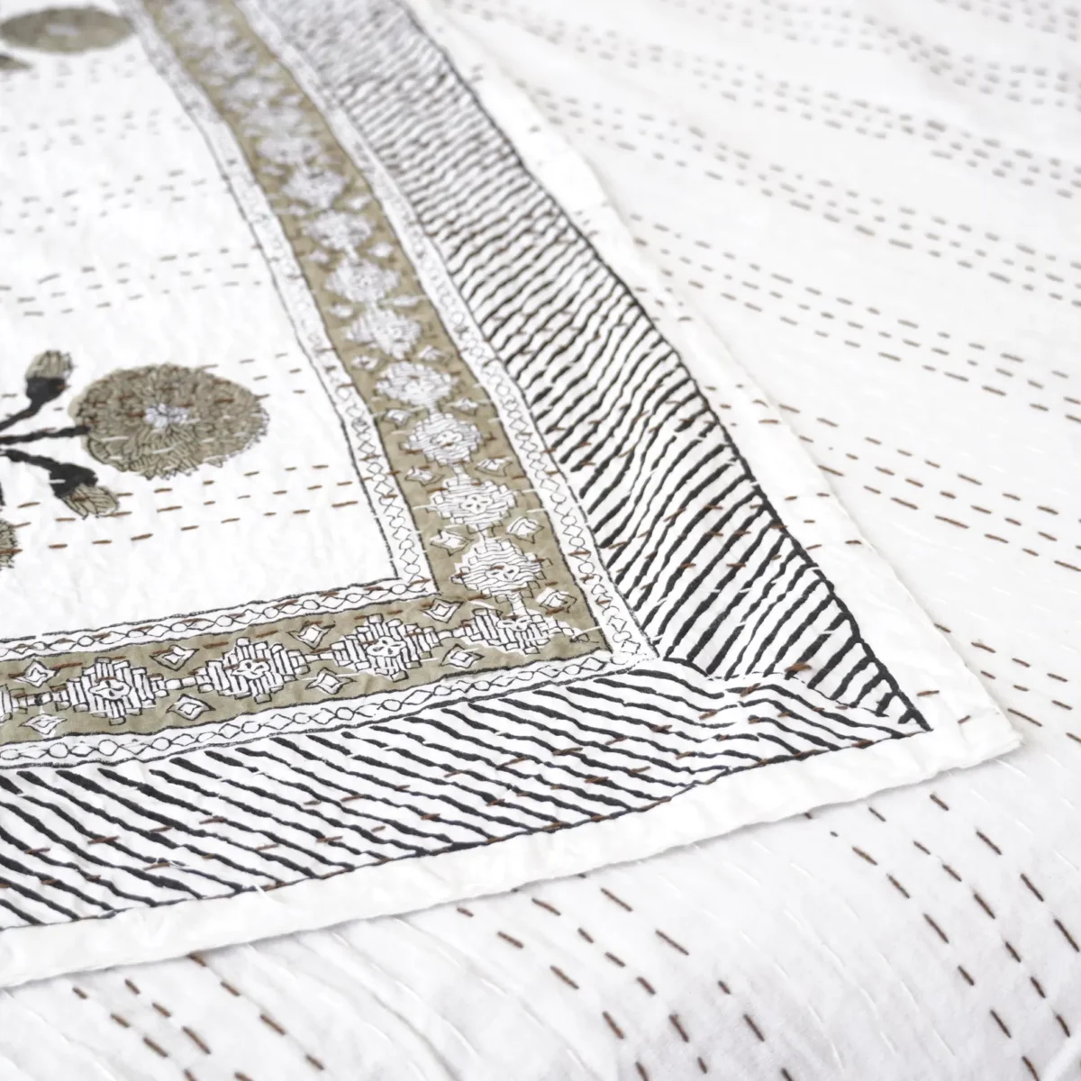 Green Leaf Kantha Quilt on Bed – Handmade Cotton Block Print Bedspread by OmraDecor