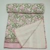 Handmade pink floral block print Kantha quilt on white cotton fabric
