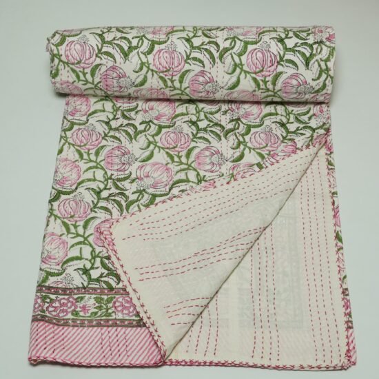 Handmade pink floral block print Kantha quilt on white cotton fabric