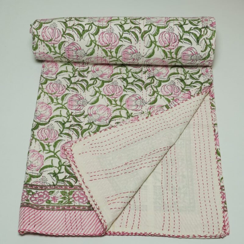 Handmade pink floral block print Kantha quilt on white cotton fabric