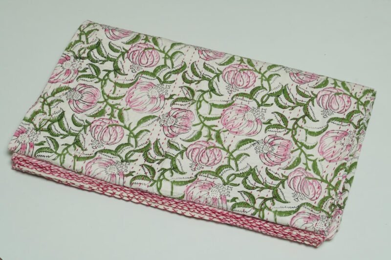 Handmade pink floral block print Kantha quilt on white cotton fabric