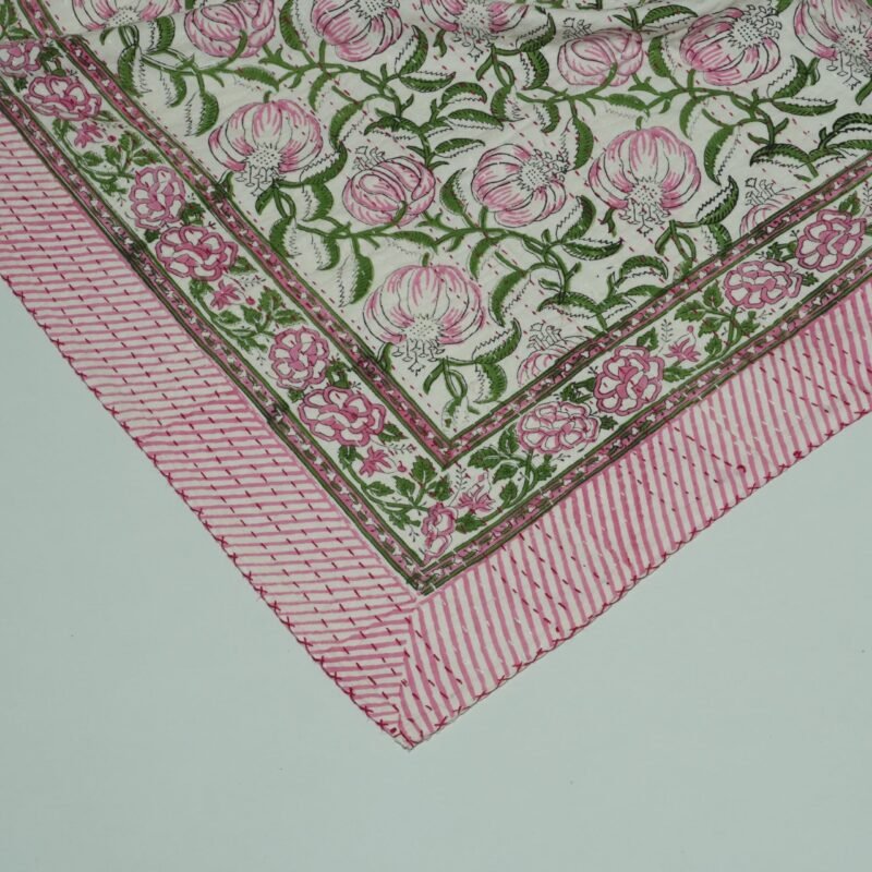 Handmade pink floral block print Kantha quilt on white cotton fabric