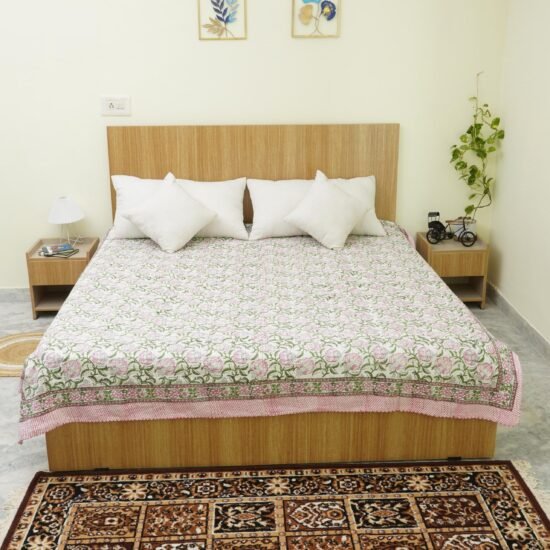 Handmade pink floral block print Kantha quilt on white cotton fabric