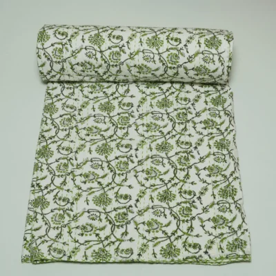 “Handmade green floral block print Kantha quilt on white cotton fabric with hand stitching”