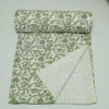 “Handmade green floral block print Kantha quilt on white cotton fabric with hand stitching”