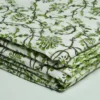 “Handmade green floral block print Kantha quilt on white cotton fabric with hand stitching”