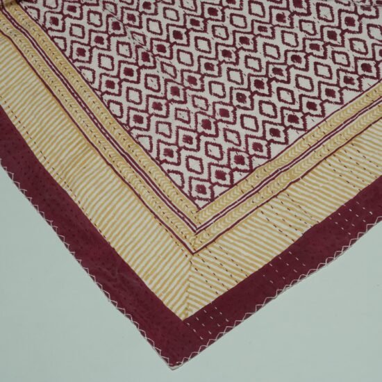 Maroon geometric block print Kantha quilt with mustard border, handmade cotton bedspread from Jaipur.