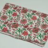 White floral block print Kantha quilt made from pure cotton, featuring red floral patterns with green leaves, handmade and reversible bedspread