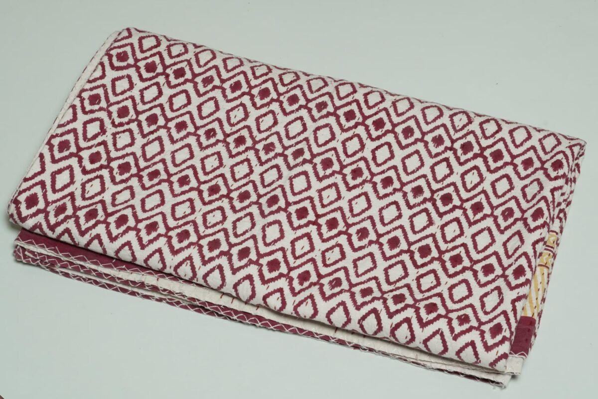 Maroon geometric block print Kantha quilt with mustard border, handmade cotton bedspread from Jaipur.
