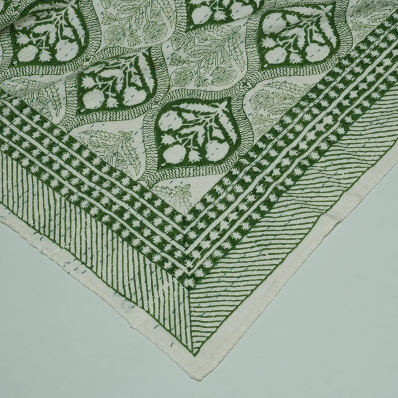 Rolled green floral paisley block print Kantha cotton fabric with handcrafted stitching on a cream base, by omradecor